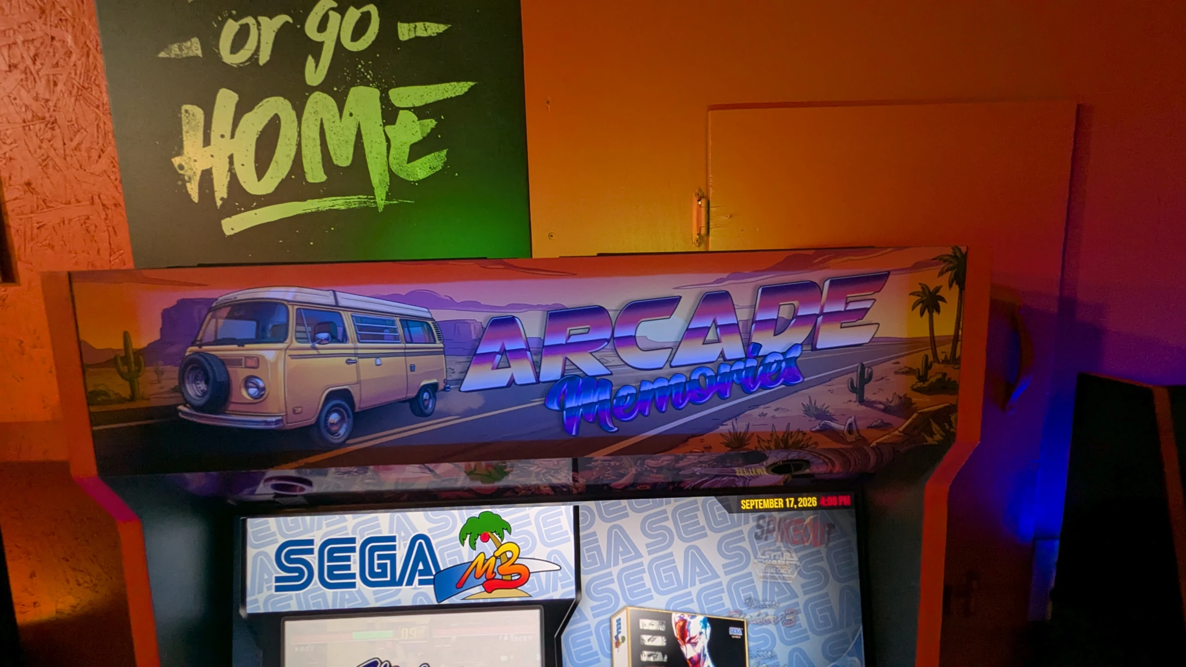Arcade Memories marquee with a camper van and sunset road design