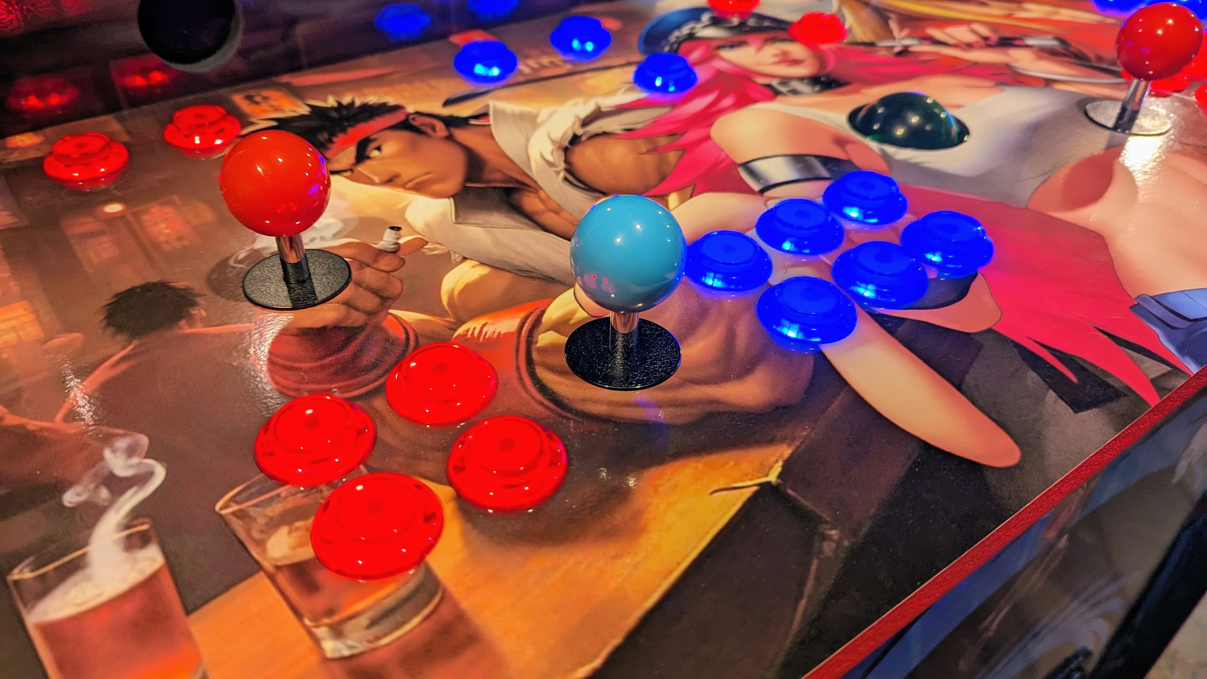 Close-up of four-player arcade controls