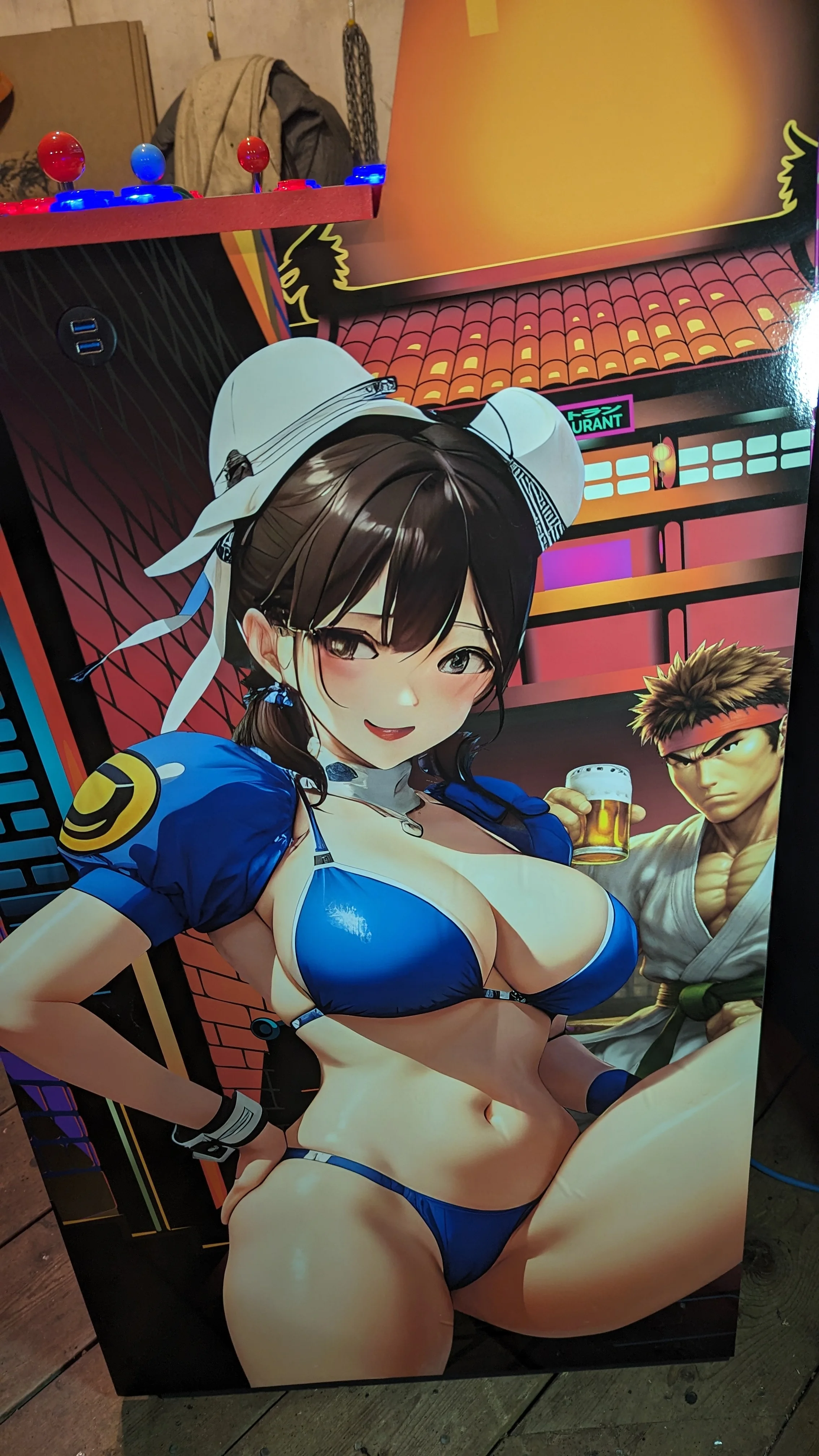 Close-up of the left-side custom artwork and USB ports