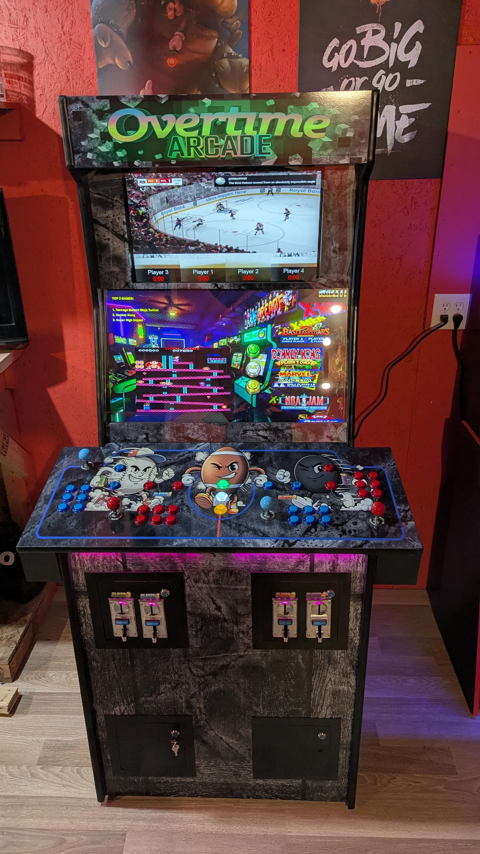 Commercial dual-screen arcade machine side cabinet view with operator access