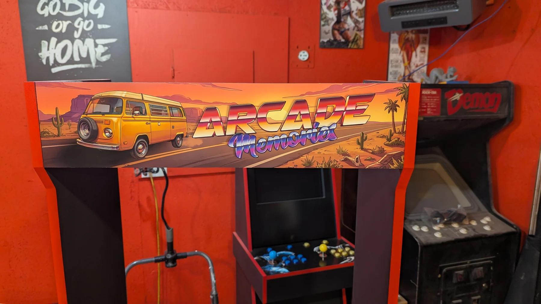 Arcade Memories marquee featuring a yellow Volkswagen Westfalia camper van on the multi-theme arcade build