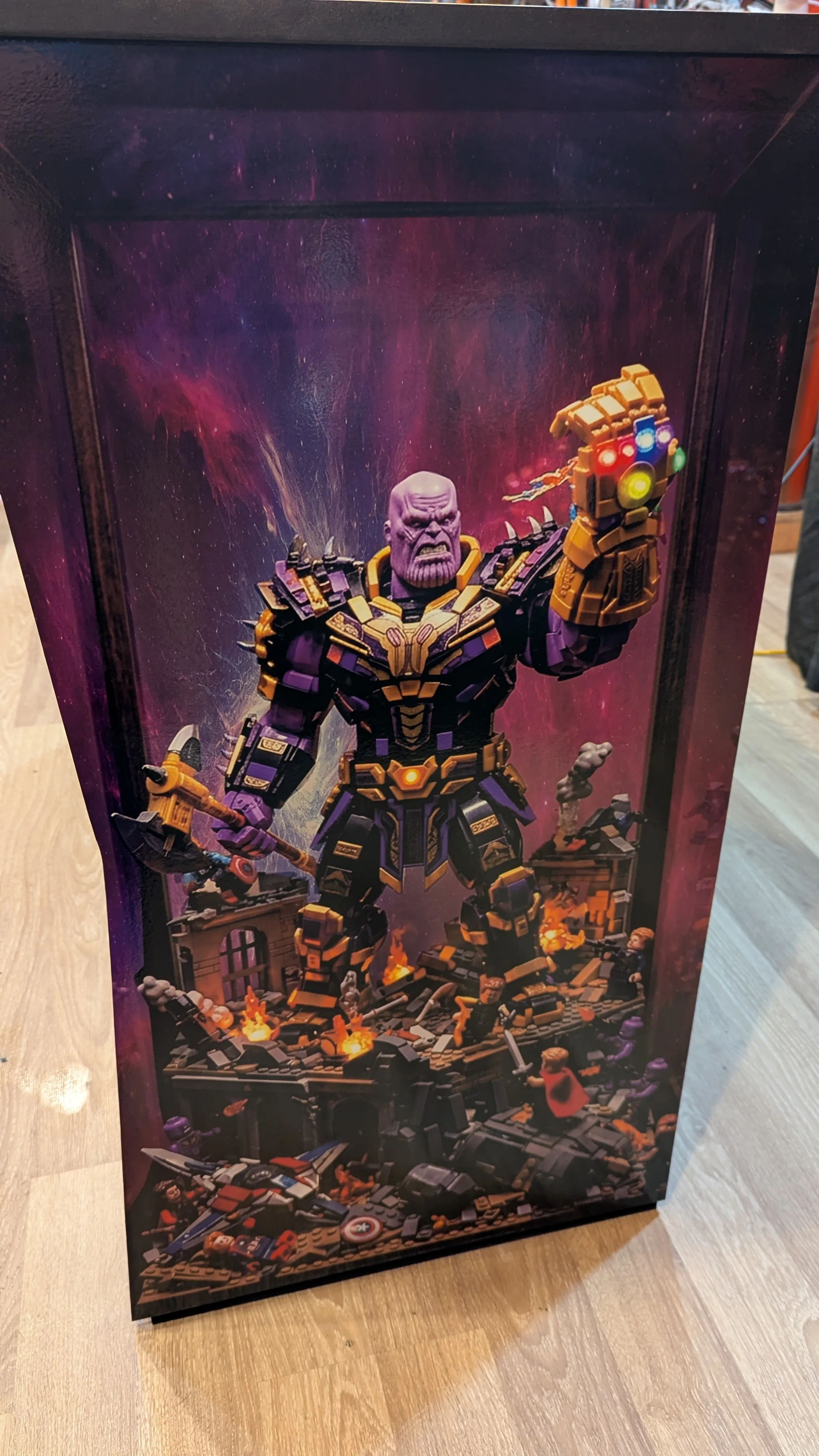 Finished LEGO Marvel Avengers pedestal arcade side artwork featuring Thanos