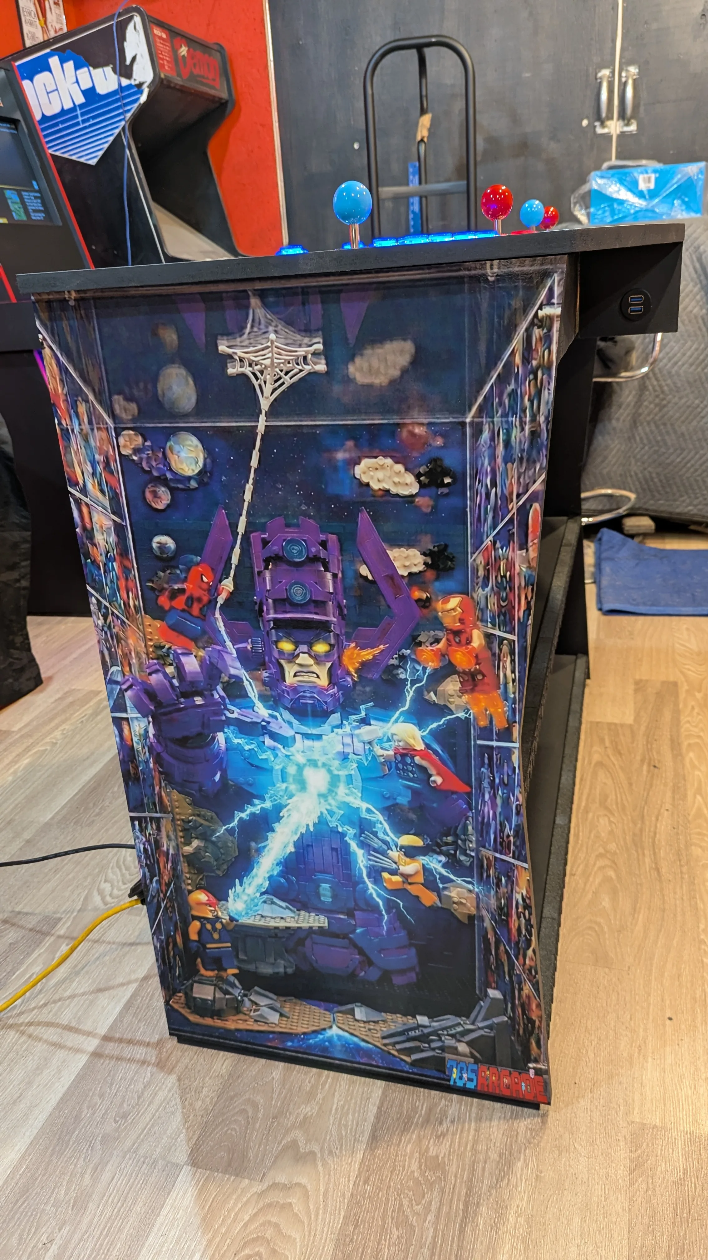 Finished Galactus side artwork on LEGO Marvel Avengers pedestal arcade machine