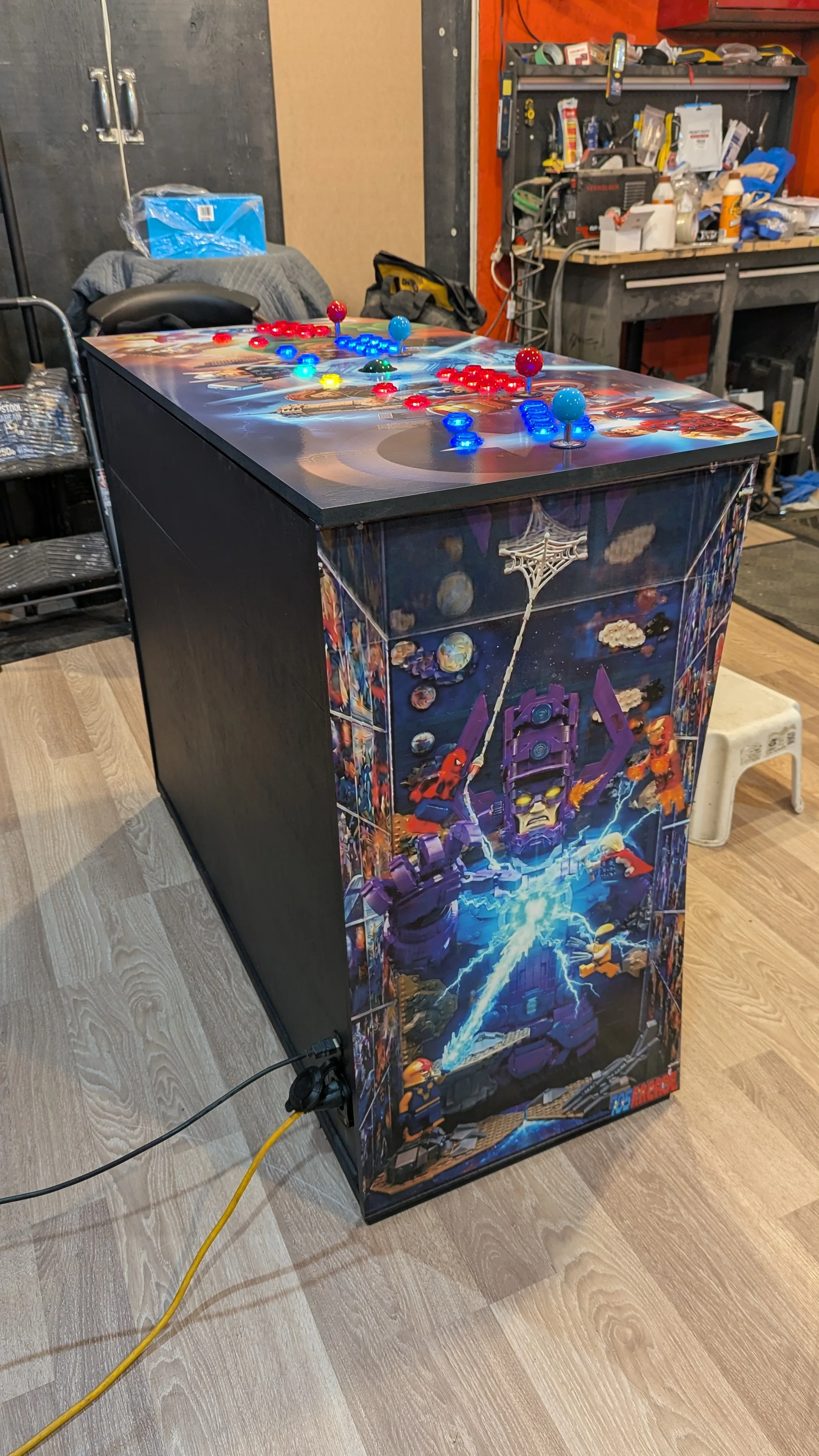 Finished LEGO Marvel Avengers arcade pedestal with Galactus side art and lit control deck