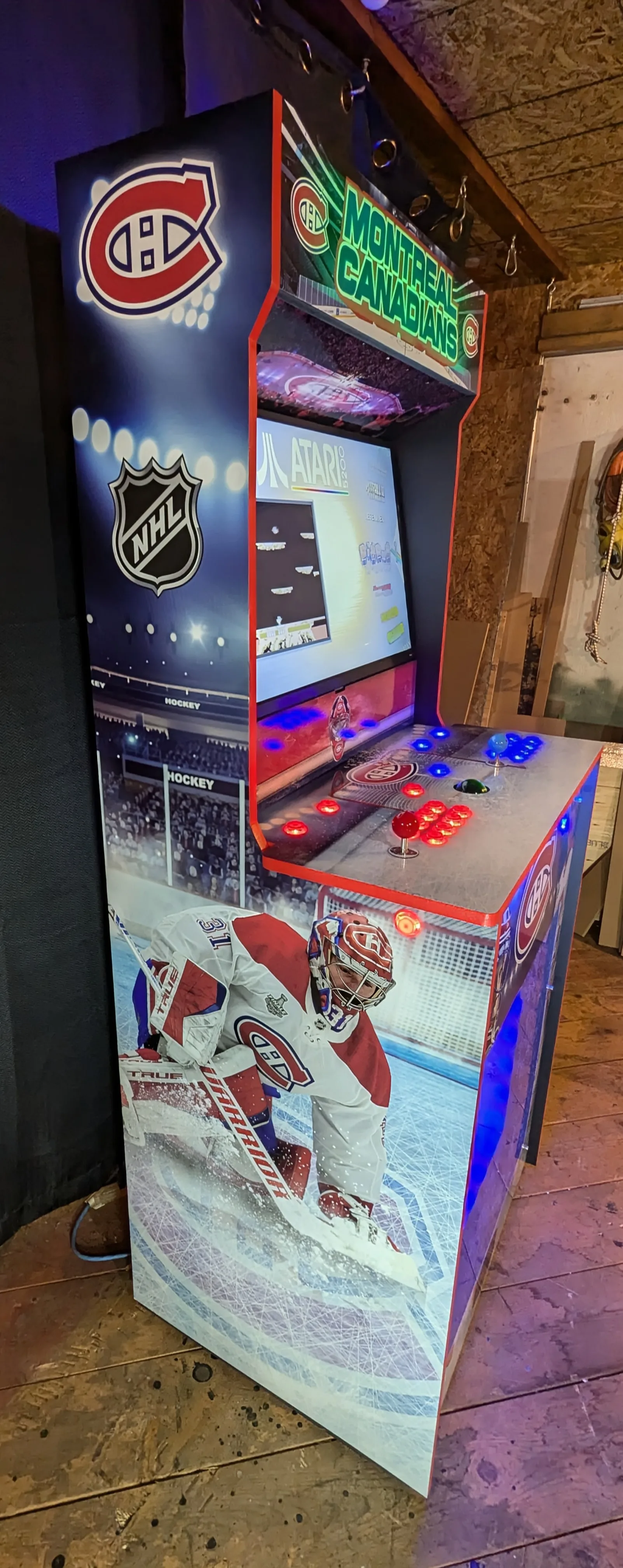 Left-side view of the Montreal Canadiens arcade machine featuring Patrick Roy