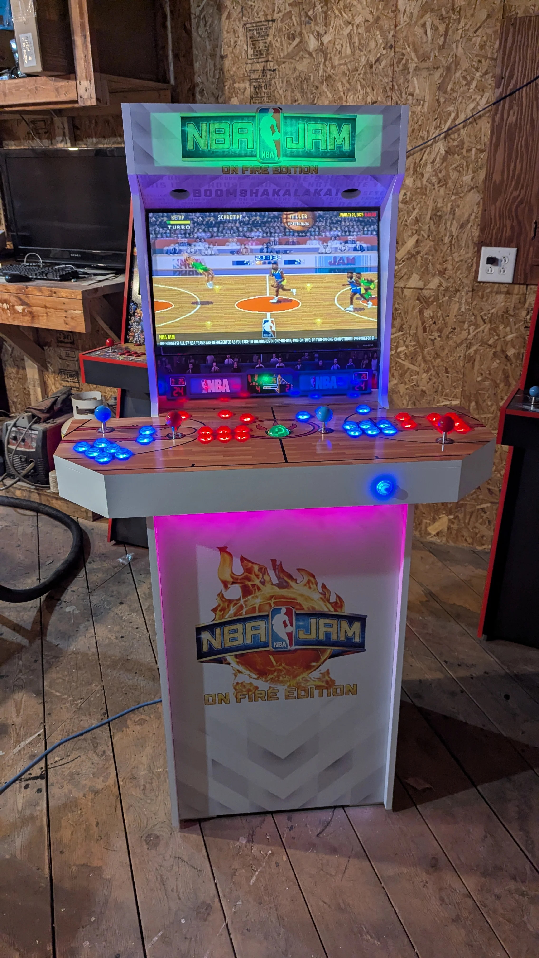 Full front view of the NBA Jam cabinet playing the original NBA Jam