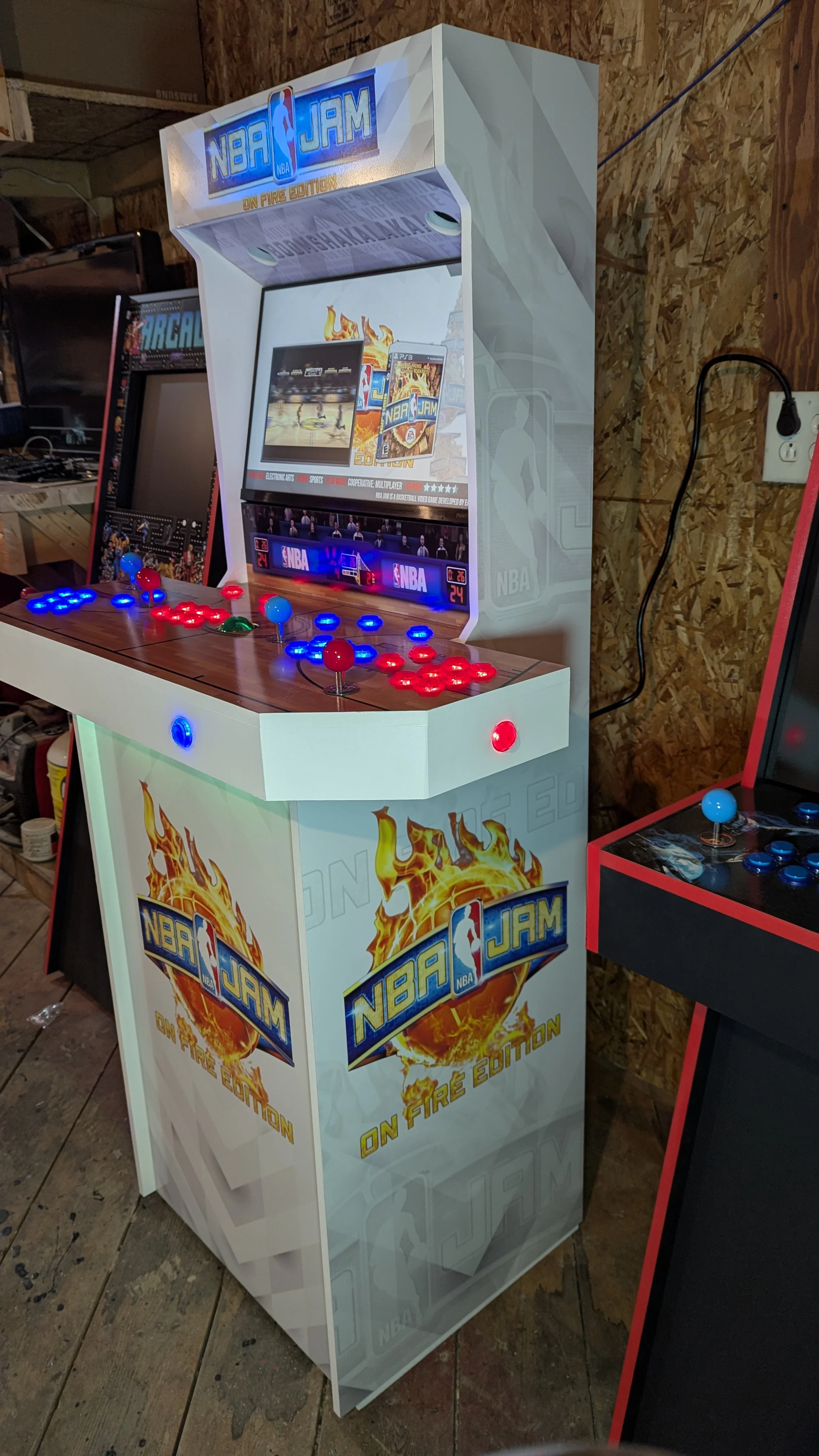 Left angle showing the full custom NBA Jam cabinet wrap