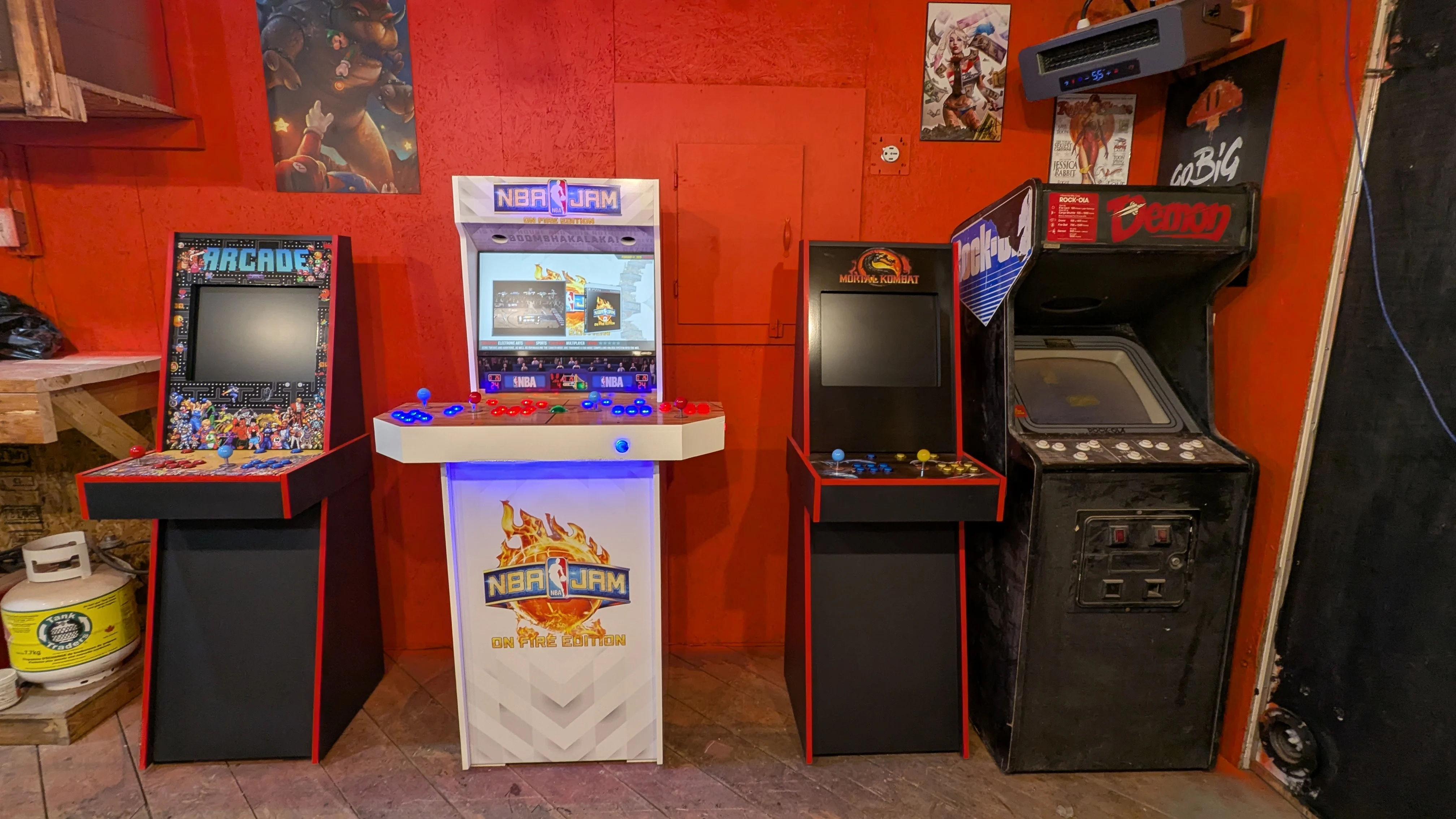 NBA Jam machine displayed with other 705Arcade cabinets in the workshop