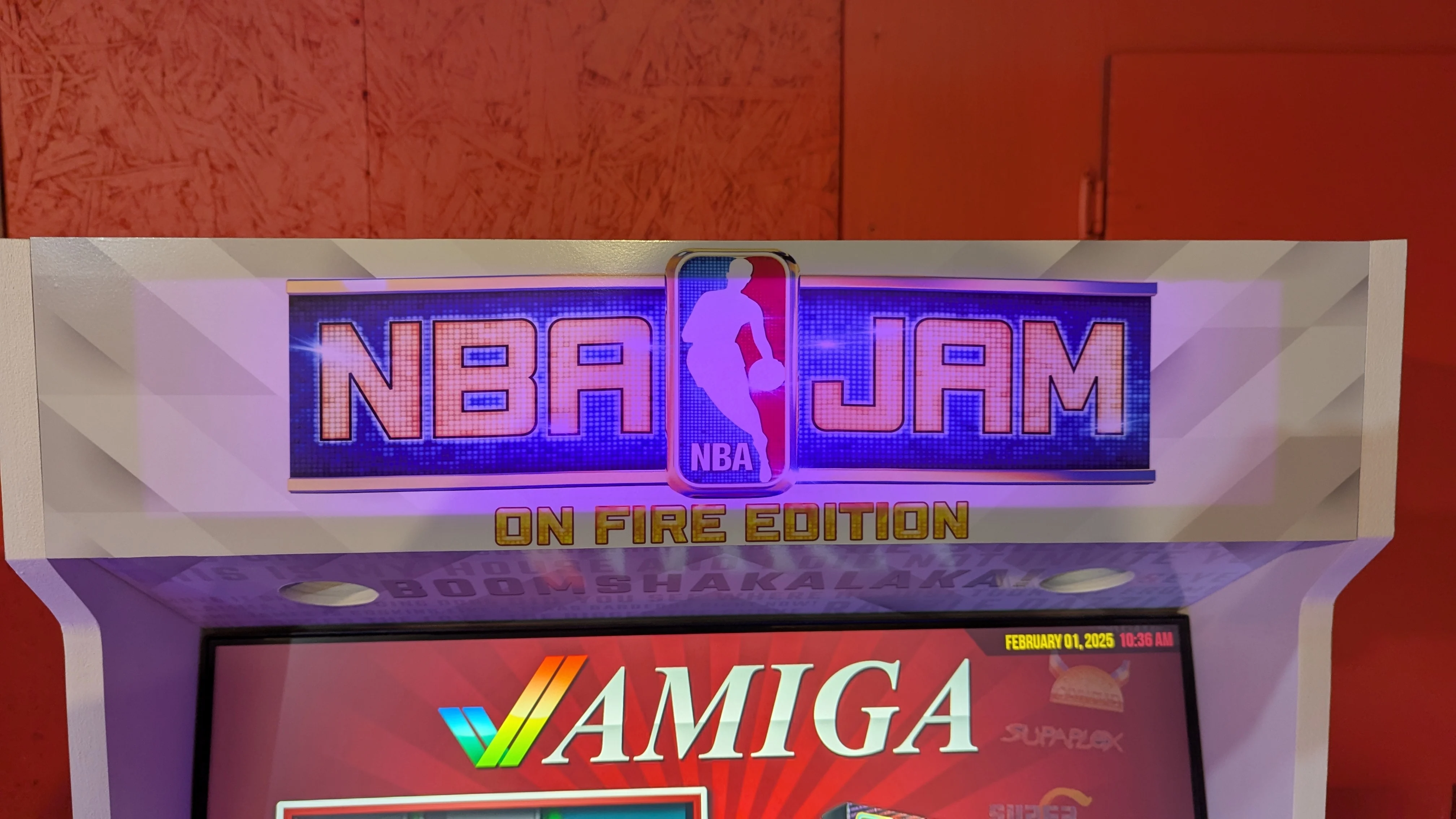 NBA Jam marquee glowing purple above the screen