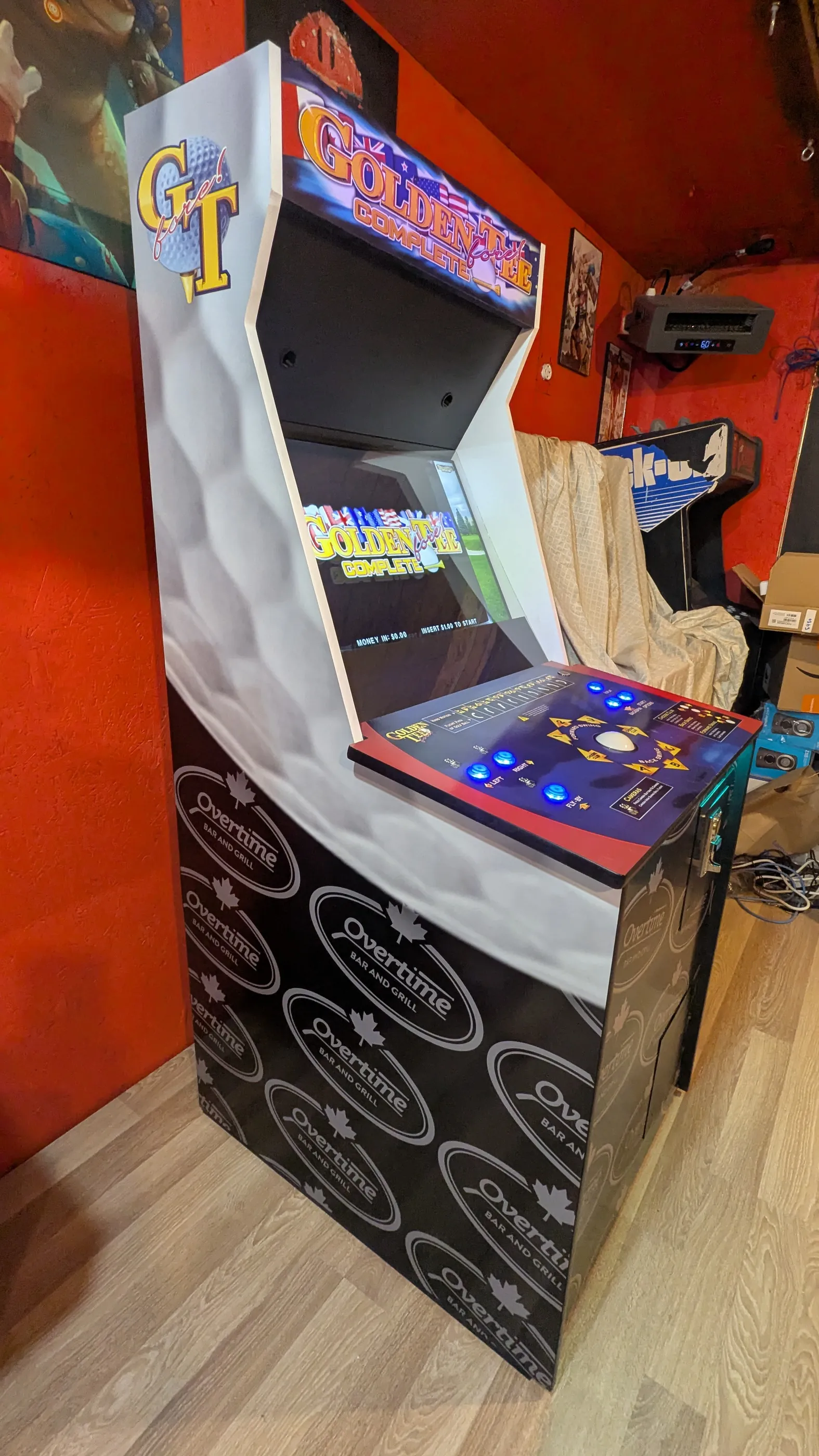 Golden Tee Fore arcade machine cabinet artwork and lit marquee detail