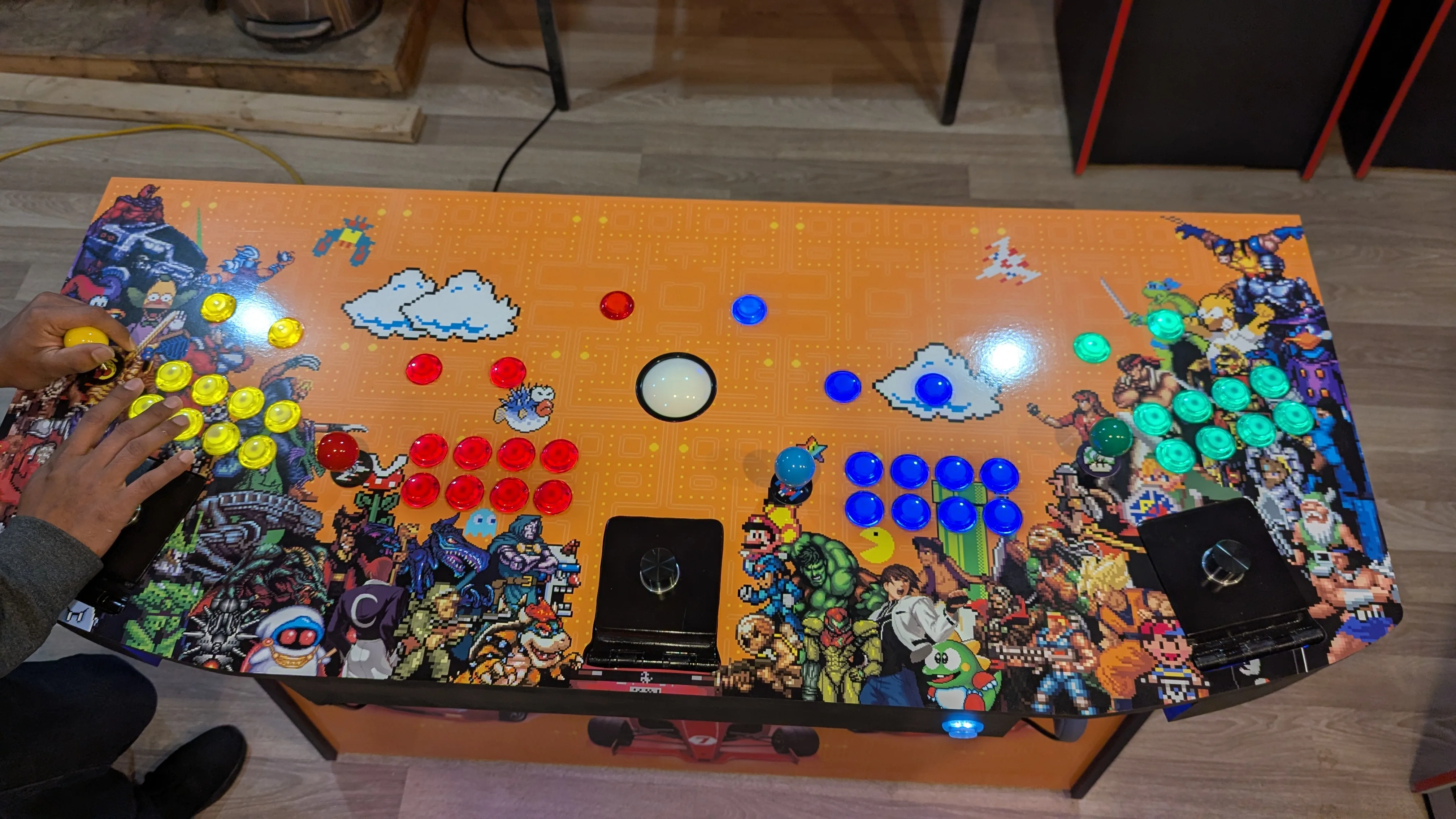 Pedestal arcade machine center control panel with trackball buttons and multi-game controls