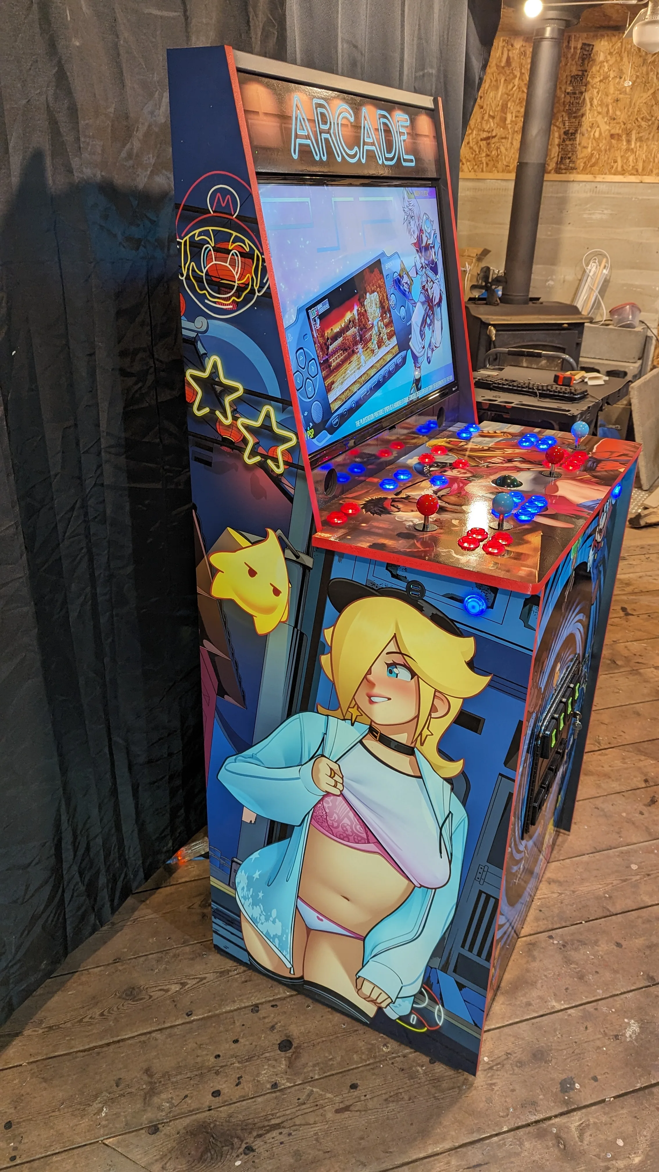 Four-player arcade control deck with illuminated buttons and trackball