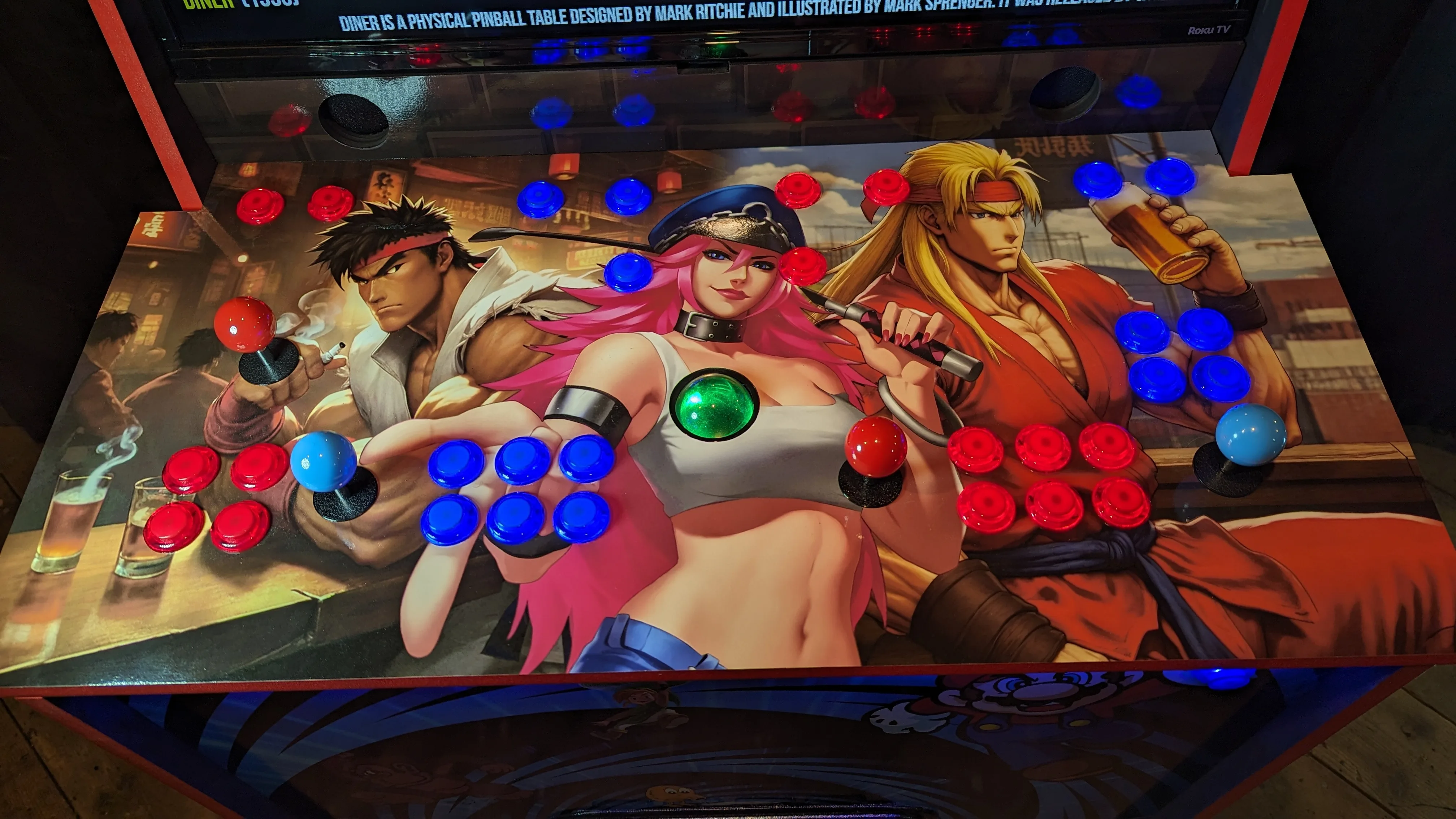 Arcade pinball karaoke machine showing virtual pinball on the 32-inch screen