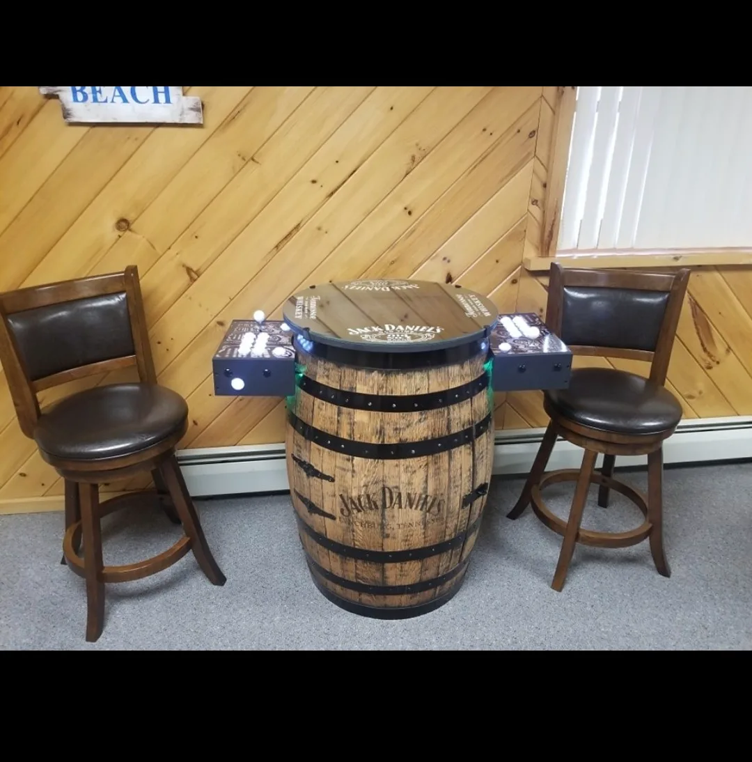Finished Jack Daniel's whiskey barrel cocktail table arcade with chairs
