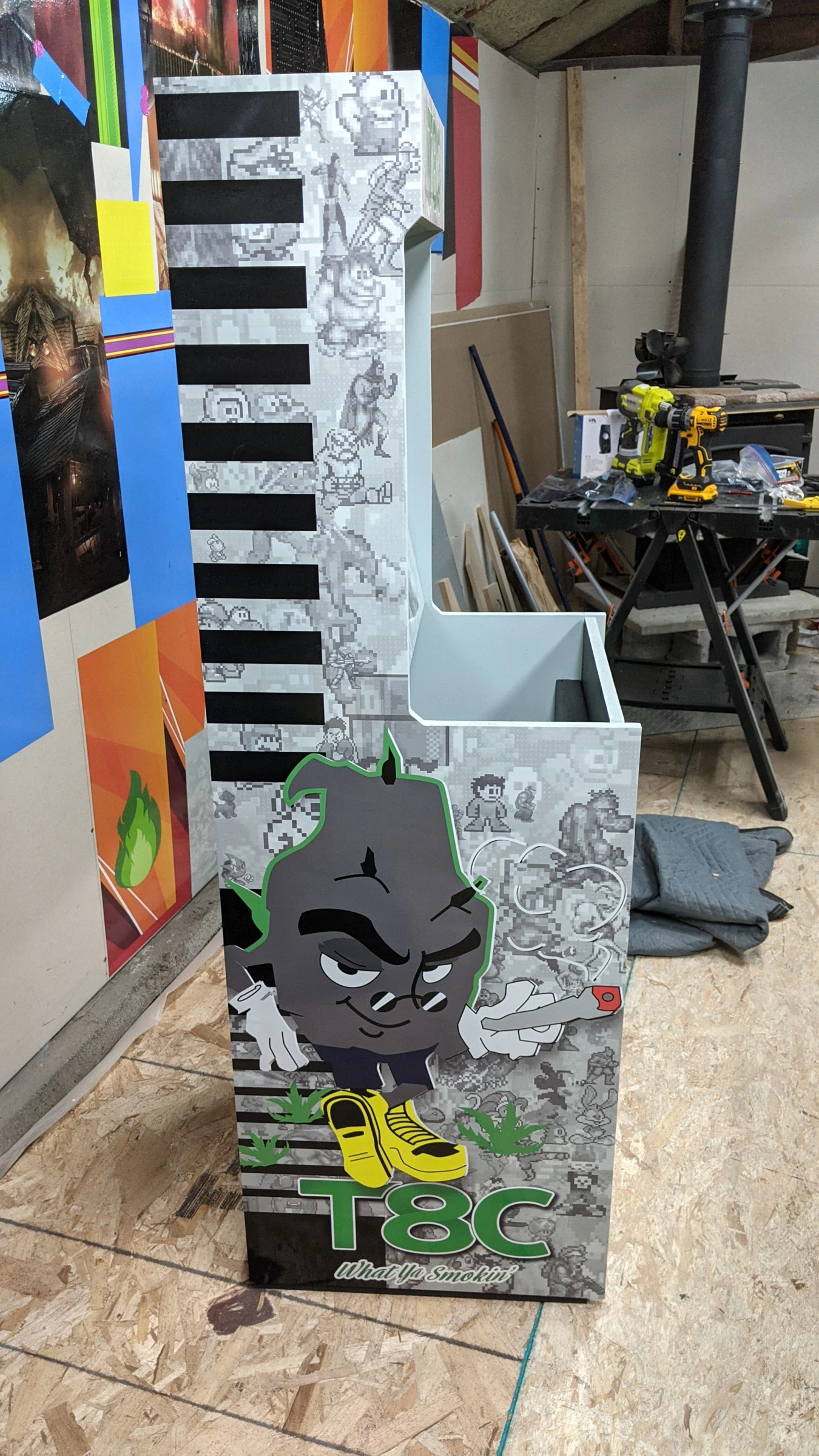 T8C cabinet during assembly with custom side artwork, before the screen and controls were installed