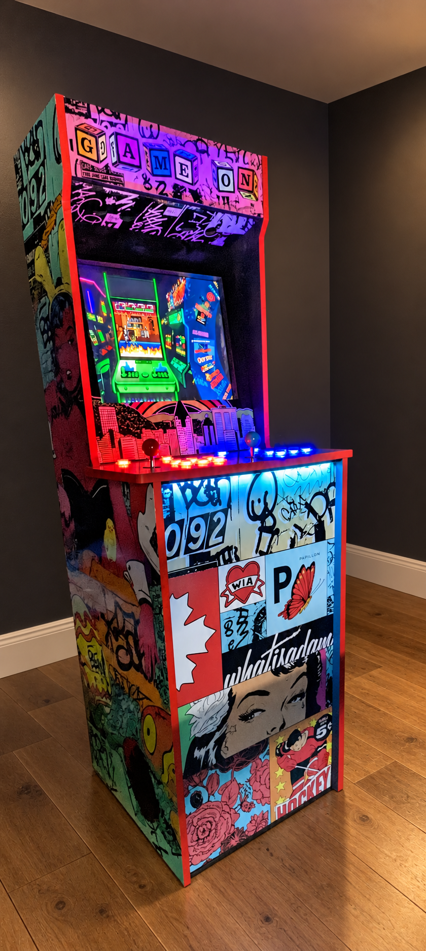 Illuminated WhatIsAdam arcade machine with GAME ON marquee and custom artwork